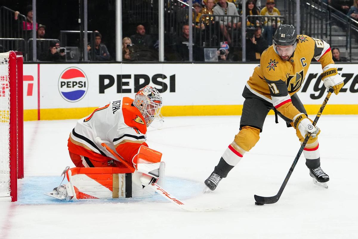  Vegas Golden Knights right wing Mark Stone (61) controls the puck in front of Anaheim Ducks goaltender Lukas Dostal (1) during the third period of game one of the second round of the 2026 Stanley Cup Playoffs at T-Mobile Arena. Stephen R. Sylvanie-Imagn Images