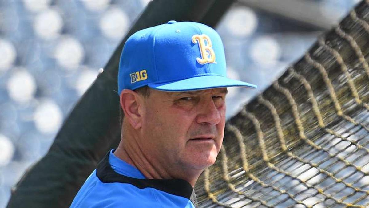  Jun 14, 2025; Omaha, Neb, USA; UCLA Bruins head coach John Savage watches the team warm up before the game against the Murray State Races at Charles Schwab Field. Mandatory Credit: Steven Branscombe-Imagn Images | Steven Branscombe-Imagn Images 