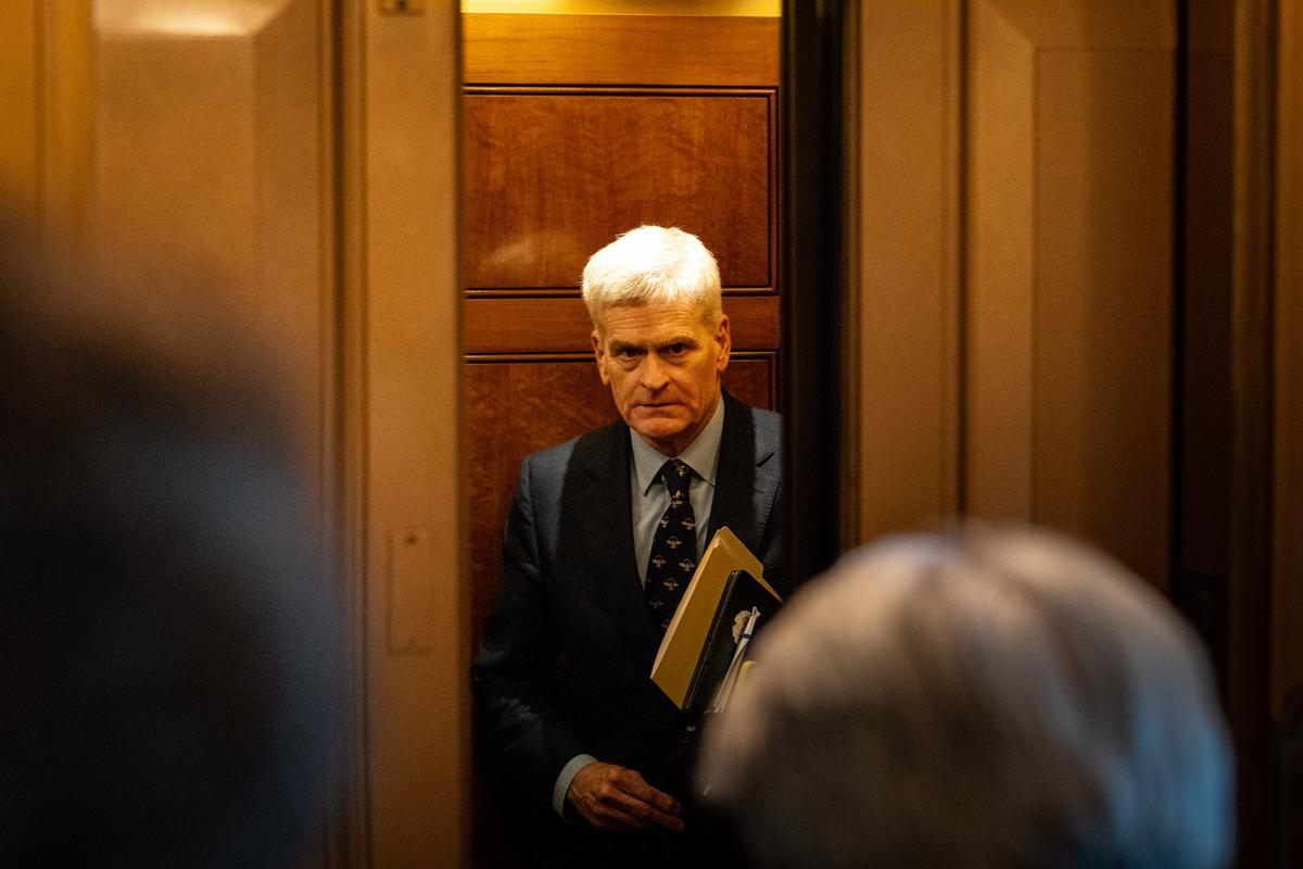 Sen. Bill Cassidy (R-La.) leaves after casting a "Yes" vote to advance the Iran war powers act on the Senate floor on Tuesday, May 19, 2026. The GOP senators' resistance to a president they have rarely challenged and frequently excused reflected how the legacy of the Jan. 6 attack by a pro-Trump mob still hangs over the party. (Haiyun Jiang/The New York Times)