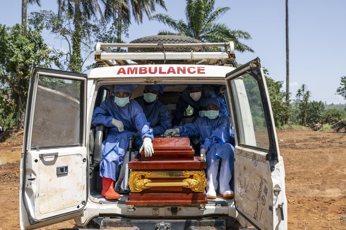 Health workers move the body of the Rev. Sylvestre Atama, a popular and charismatic preacher who died of Ebola, for safe burial in the mining town of Mongbwalu, Democratic Republic of Congo, May 25, 2026. In a remote gold mining town at the epicenter of the Ebola outbreak, medical workers struggle to beat back a surge of deaths and infections. (Arlette Bashizi/The New York Times)