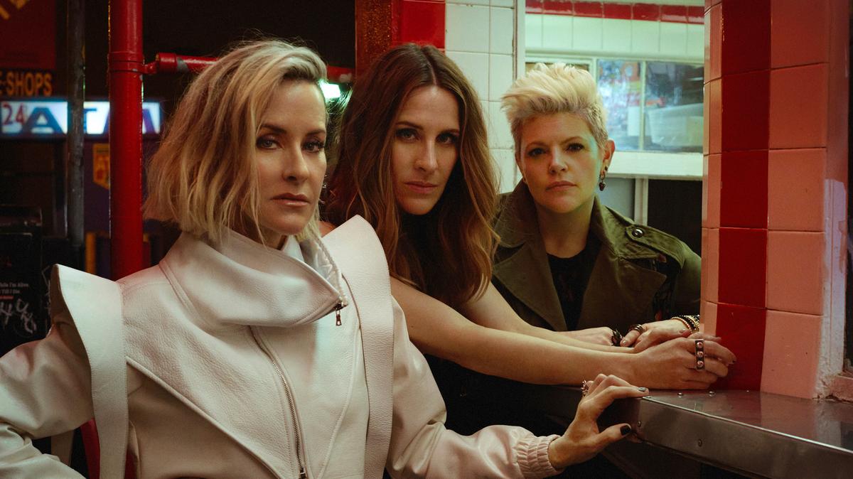 Martie Maguire, left, Emily Robison and Natalie Maines of The Chicks, appear in a 2020 photo. The Chicks are heading back on tour this summer, their first major outing since 2017 and first shows since releasing their fifth studio album “Gaslighter.” The 13-time Grammy winners will hit 27 North American cities starting in June and running through August.