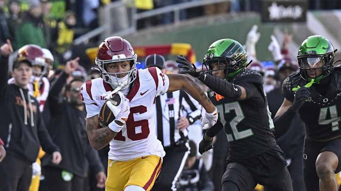  Nov 22, 2025; Eugene, Oregon, USA; Southern California Trojans wide receiver Tanook Hines (16) runs with the ball during the first half against the Oregon Ducks at Autzen Stadium. Mandatory Credit: Troy Wayrynen-Imagn Images | Troy Wayrynen-Imagn Images 