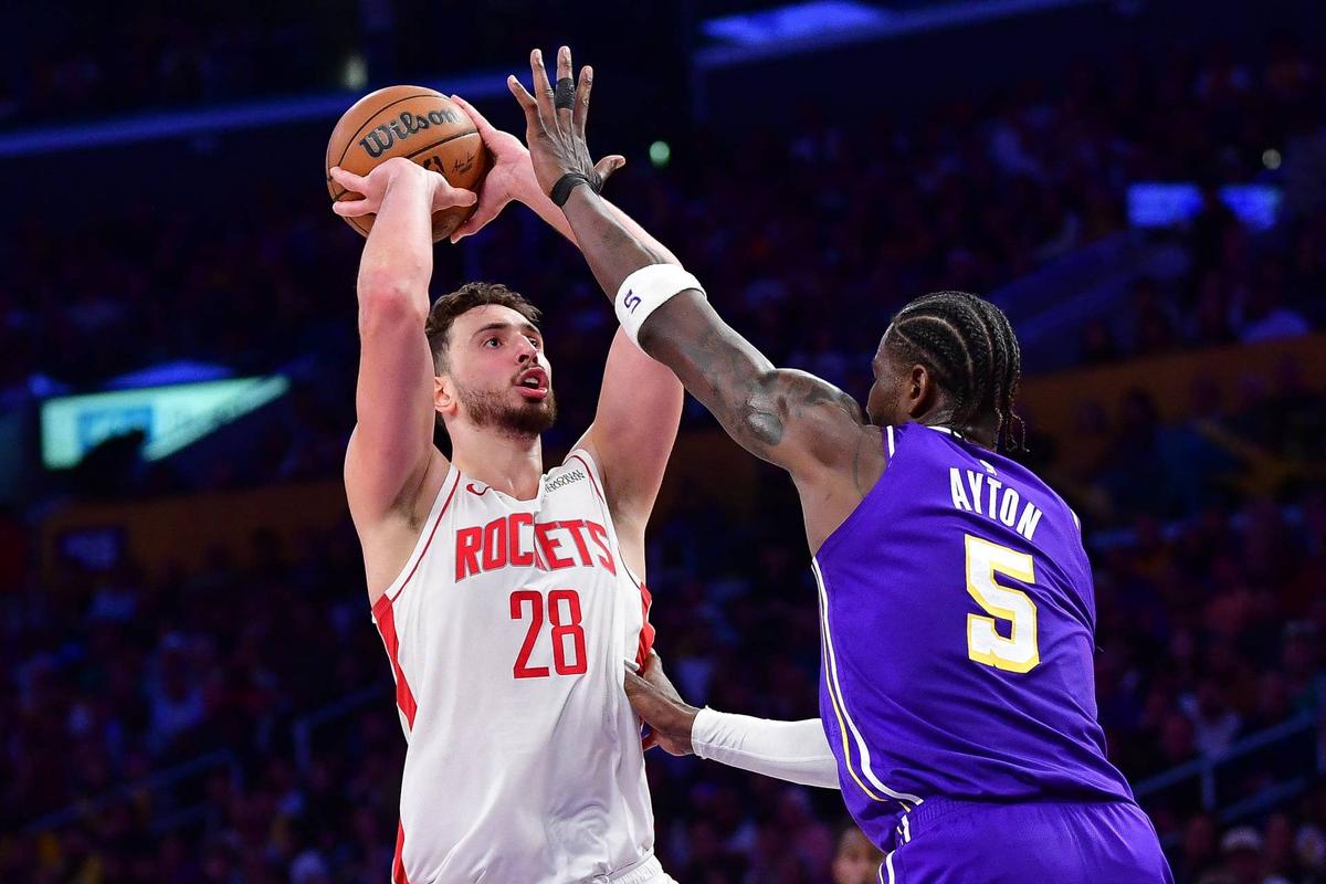  Houston Rockets center Alperen Şengün shoots over Los Angeles Lakers center Deandre Ayton during Game 5 of their first-round playoff series at Crypto.com Arena on April 29, 2026. Gary A. Vasquez-Imagn Images