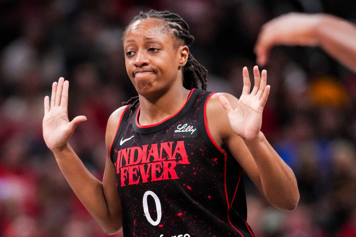  Indiana Fever guard Kelsey Mitchell (0) reacts during a WNBA game. © Grace Smith/IndyStar / USA TODAY NETWORK via Imagn Images