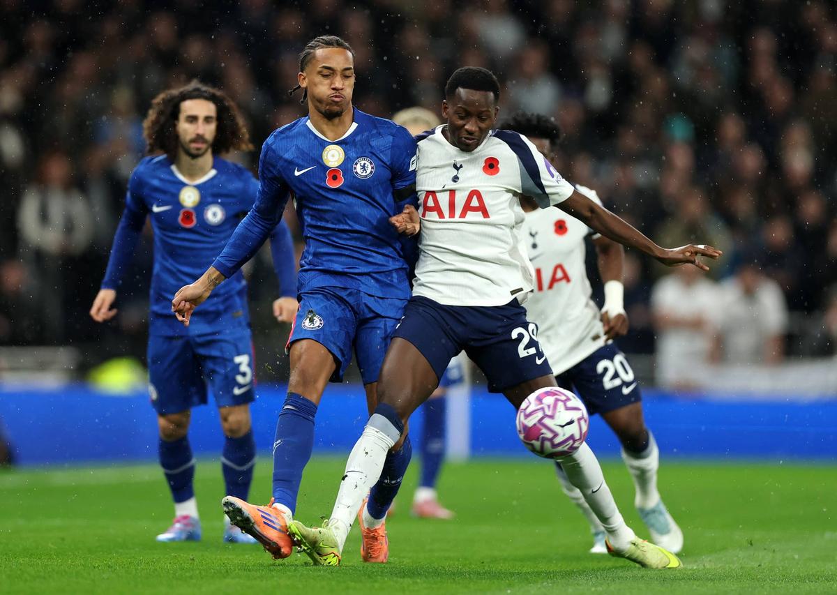  Pape Sarr is challenged by Joao Pedro during the Premier League match between Tottenham Hotspur and Chelsea. Photo by Alex Pantling/Getty Images