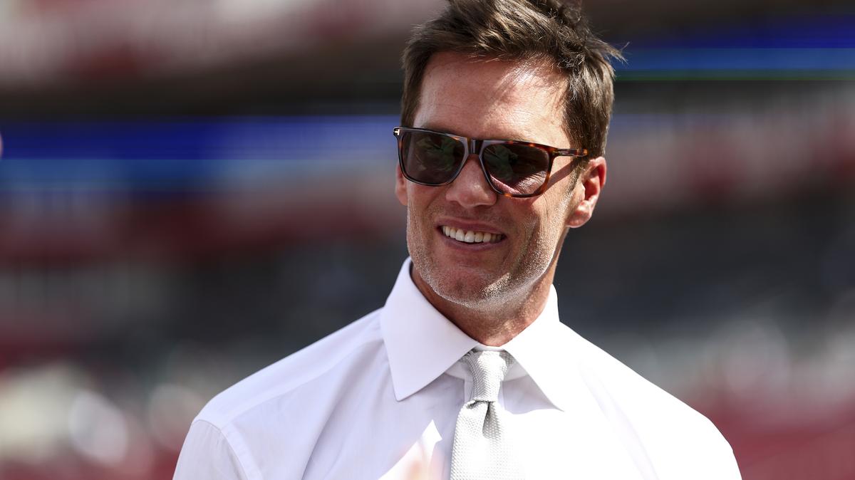TAMPA, FLORIDA - SEPTEMBER 28: Fox Sports commentator and former NFL quarterback Tom Brady smiles prior to an NFL football game between the Tampa Bay Buccaneers and the Philadelphia Eagles at Raymond James Stadium on September 28, 2025 in Tampa, Florida. (Photo by Kevin Sabitus/Getty Images)