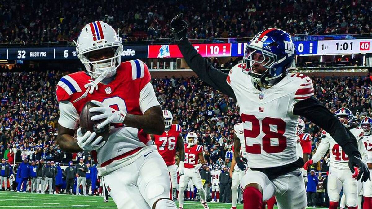  Dec 1, 2025; Foxborough, Massachusetts, USA; New England Patriots wide receiver Kayshon Boutte (9) catches a pass for a touchdown against New York Giants cornerback Cor'Dale Flott (28) during the first quarter at Gillette Stadium. Mandatory Credit: David Butler II-Imagn Images | David Butler II-Imagn Images 