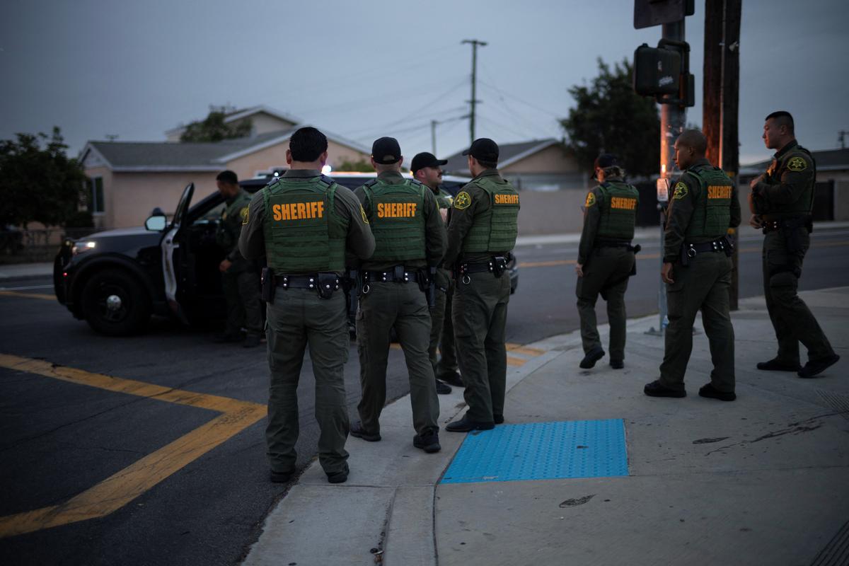 Law enforcement officers stand near an evacuation zone, after residents were ordered to evacuate because of a failing tank containing methyl methacrylate, a flammable liquid used in the aerospace industry, in Stanton, California, U.S., May 23, 2026,  REUTERS/Ed Ou