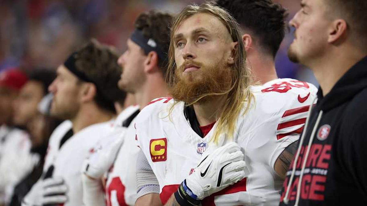  Dec 22, 2025; Indianapolis, Indiana, USA; San Francisco 49ers tight end George Kittle (85) looks on during the National Anthem prior to the game against the Indianapolis Colts at Lucas Oil Stadium. Mandatory Credit: Trevor Ruszkowski-Imagn Images | Trevor Ruszkowski-Imagn Images 