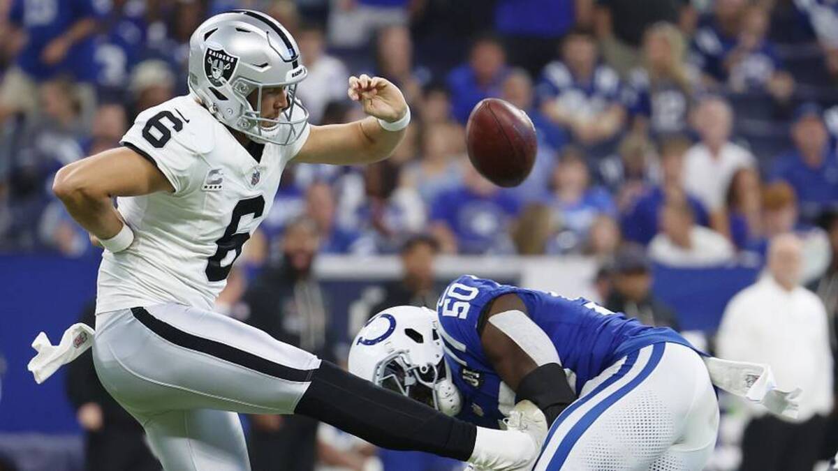  Oct 5, 2025; Indianapolis, Indiana, USA; Indianapolis Colts linebacker Segun Olubi (50) blocks a punt by Las Vegas Raiders punter AJ Cole (6) during the second quarter at Lucas Oil Stadium. Mandatory Credit: Trevor Ruszkowski-Imagn Images | Trevor Ruszkowski-Imagn Images 