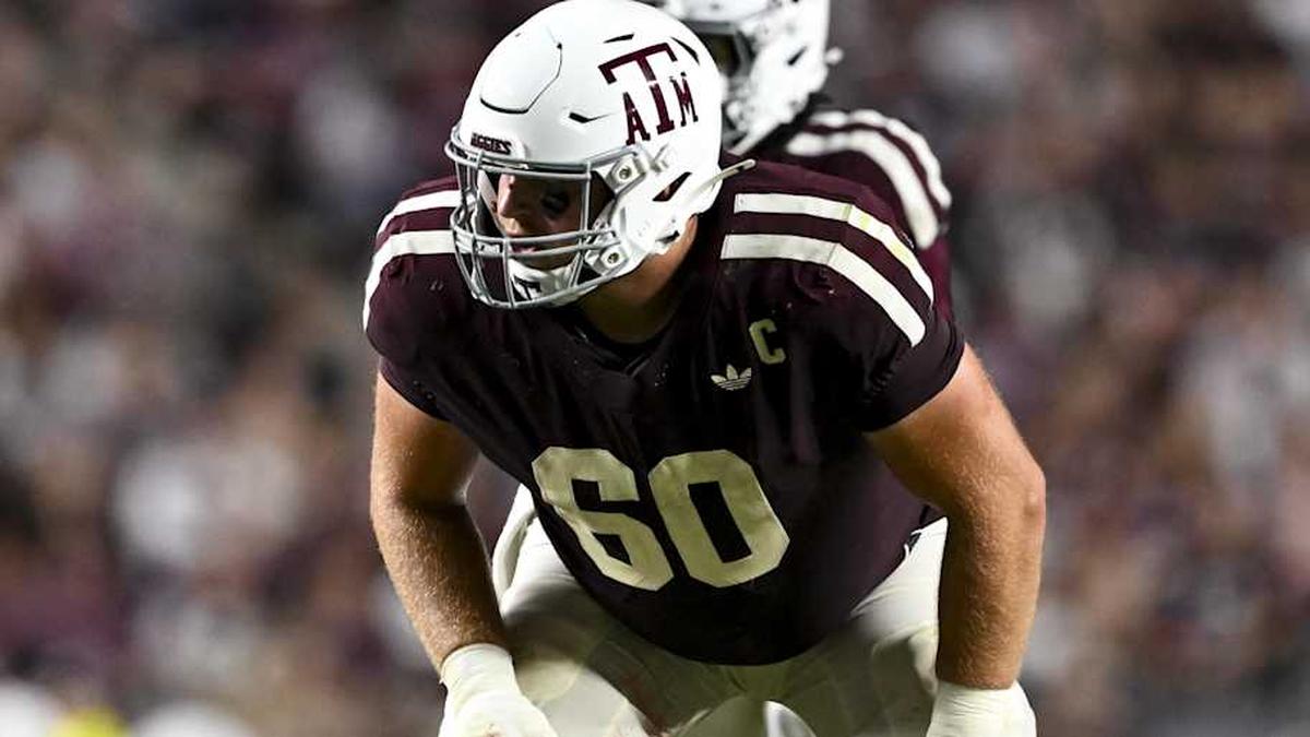  Oct 11, 2025; College Station, Texas, USA; Texas A&M Aggies offensive lineman Trey Zuhn III (60) lines up during the fourth quarter against the Florida Gators at Kyle Field. Mandatory Credit: Maria Lysaker-Imagn Images | Maria Lysaker-Imagn Images 