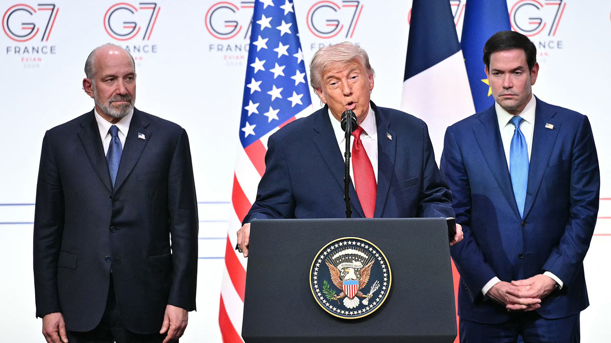 U.S. President Donald Trump, center, addresses the media alongside U.S. Secretary of State Marco Rubio, right, and U.S. Commerce Secretary Howard Lutnick, left, during a closing press conference at the G7 summit in Evian, France, on June 17, 2026.  (Mandel Ngan/AFP/Getty Images/TNS)