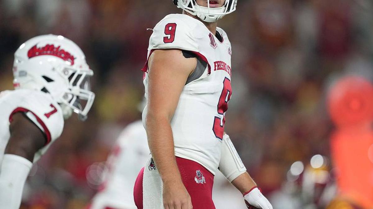  Sep 17, 2022; Los Angeles, California, USA; Fresno State Bulldogs quarterback Jake Haener (9) reacts against the Southern California Trojans in the first half at United Airlines Field at Los Angeles Memorial Coliseum. Mandatory Credit: Kirby Lee-Imagn Images | Kirby Lee-Imagn Images 