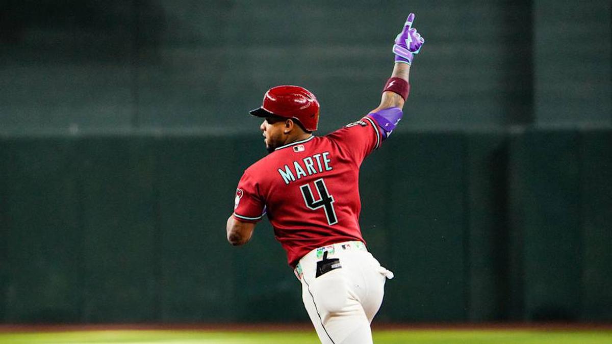  Apr 5, 2026; Phoenix, Arizona, USA; Arizona Diamondbacks second baseman Ketel Marte (4) celebrates his two run home run against the Atlanta Braves during the tenth inning at Chase Field. | Arianna Grainey-Imagn Images 