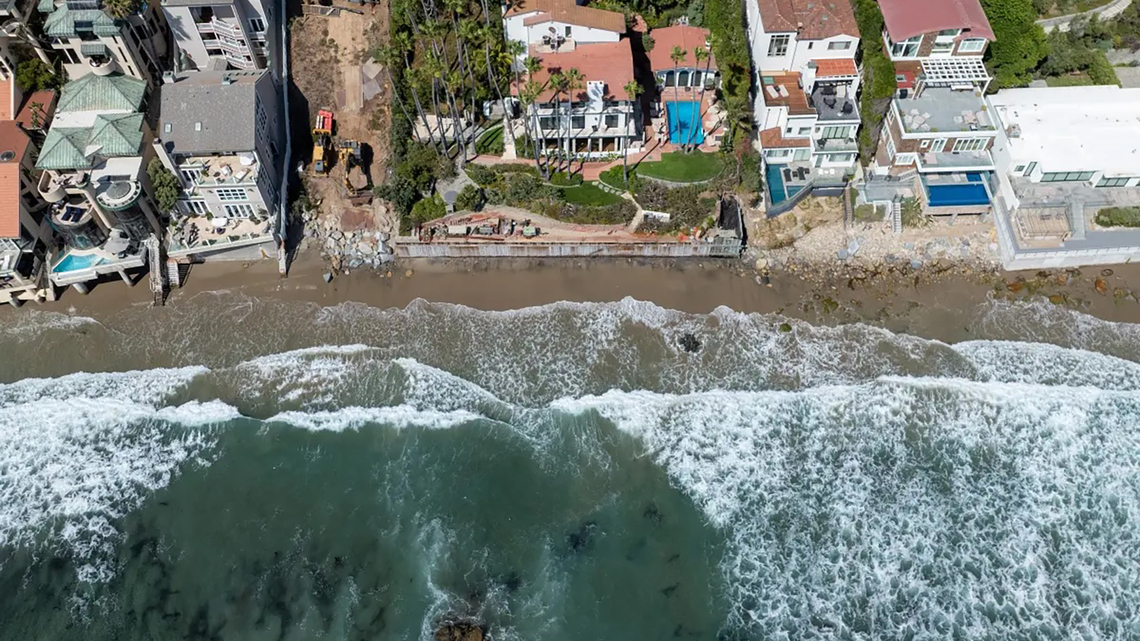 A billionaire was accused of stealing Malibu sand. Now he's donating a new beach to the public 