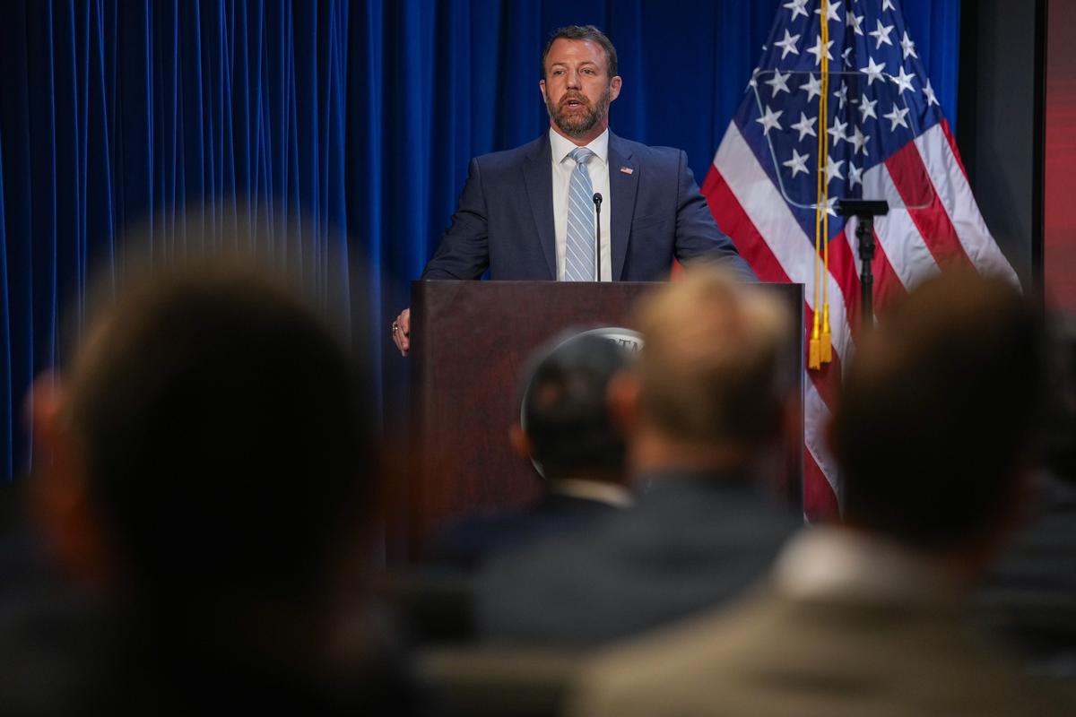  Department of Homeland Security Secretary Markwayne Mullin speaks during an event marking National Police Week at U.S. Immigration and Customs Enforcement headquarters on May 13 in Washington, D.C. 