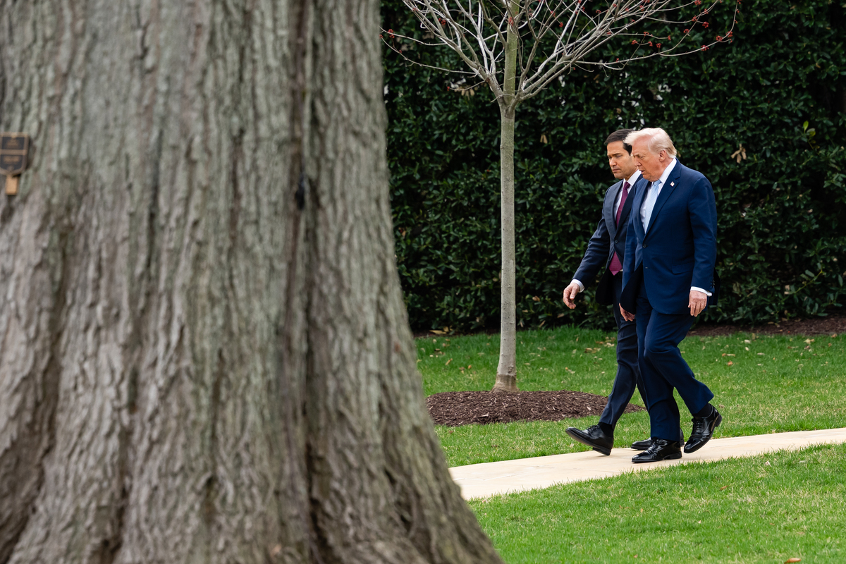 FILE -- President Donald Trump departs the White House with Secretary of State Marco Rubio in Washington on March 20, 2026. The secretary of state effectively controls Venezuela's finances, the distribution of its natural resources and its government. (Eric Lee/The New York Times)