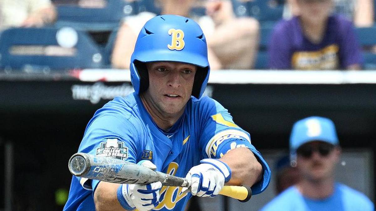  Jun 14, 2025; Omaha, Neb, USA; UCLA Bruins shortstop Roch Cholowsky (1) bunts in a run against the Murray State Racers during the fourth inning at Charles Schwab Field. Mandatory Credit: Steven Branscombe-Imagn Images | Steven Branscombe-Imagn Images 