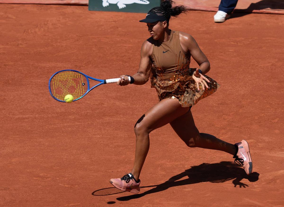  May 26, 2026; Paris, France; Naomi Osaka of Japan returns a shot during her match against Laura Siegemund of Germany on day three at Stade Roland Garros. Mandatory Credit: Susan Mullane-Imagn Images 