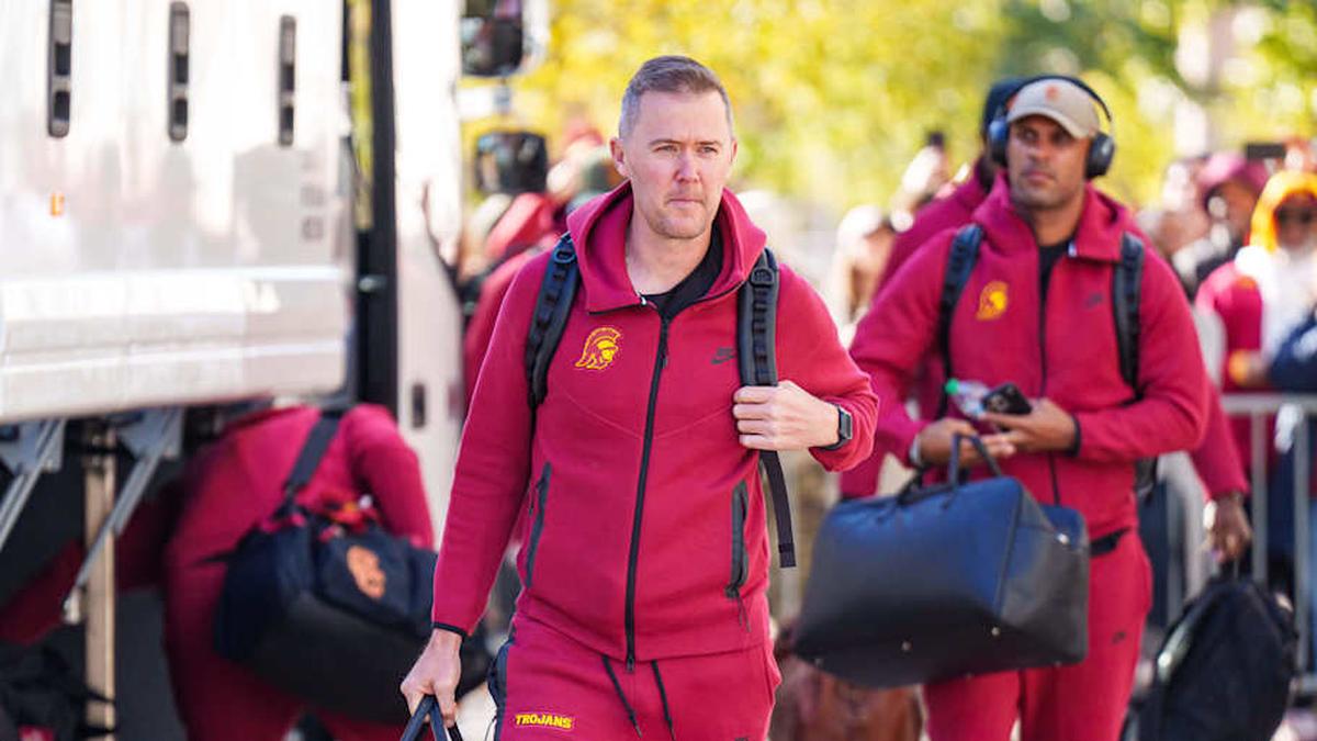  Nov 1, 2025; Lincoln, Nebraska, USA; Southern California Trojans head coach Lincoln Riley arrives at the stadium before the game against the Nebraska Cornhuskers at Memorial Stadium. Mandatory Credit: Dylan Widger-Imagn Images | Dylan Widger-Imagn Images 