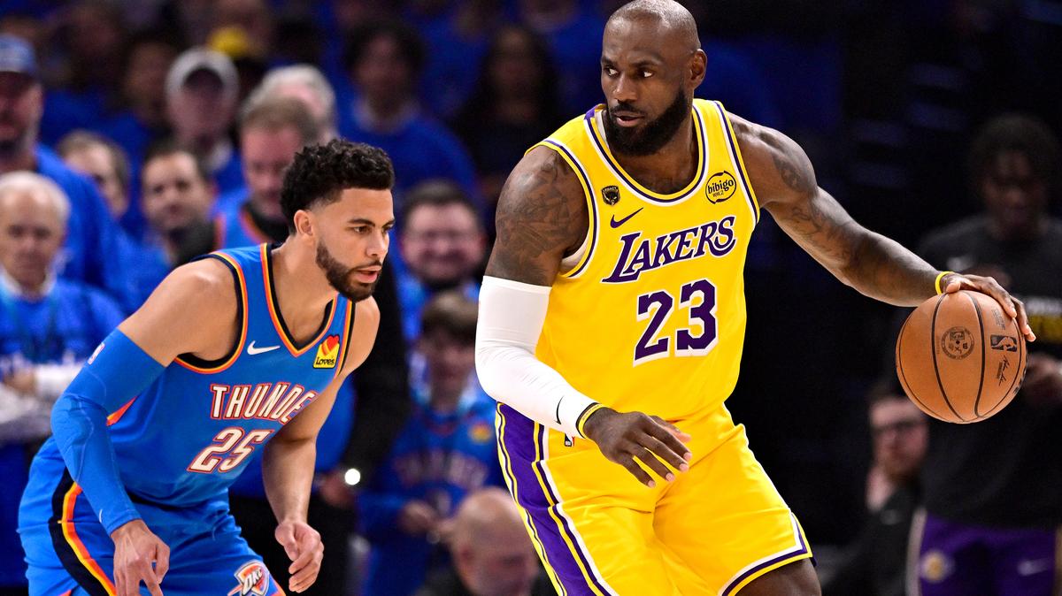 The Los Angeles Lakers' LeBron James (23) works against the Oklahoma City Thunder's Ajay Mitchell (25) during the first quarter in Game 1 of a second-round playoff series at Paycom Center on Tuesday, May 5, 2026, in Oklahoma City. (Joshua Gateley/Getty Images/TNS)