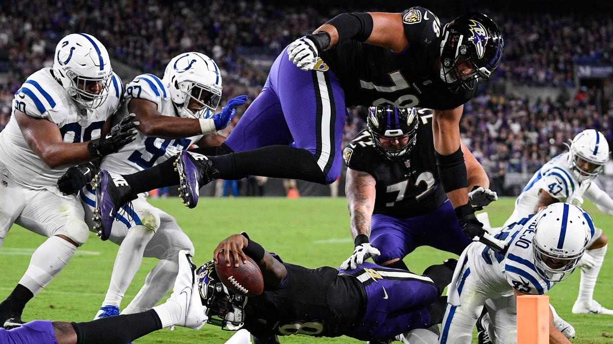 Baltimore Ravens quarterback Lamar Jackson (8) stretches for a failed attempt for a 2-point conversion during the second half of an NFL football game against the Indianapolis Colts, Monday, Oct. 11, 2021, in Baltimore. (AP Photo/Nick Wass)