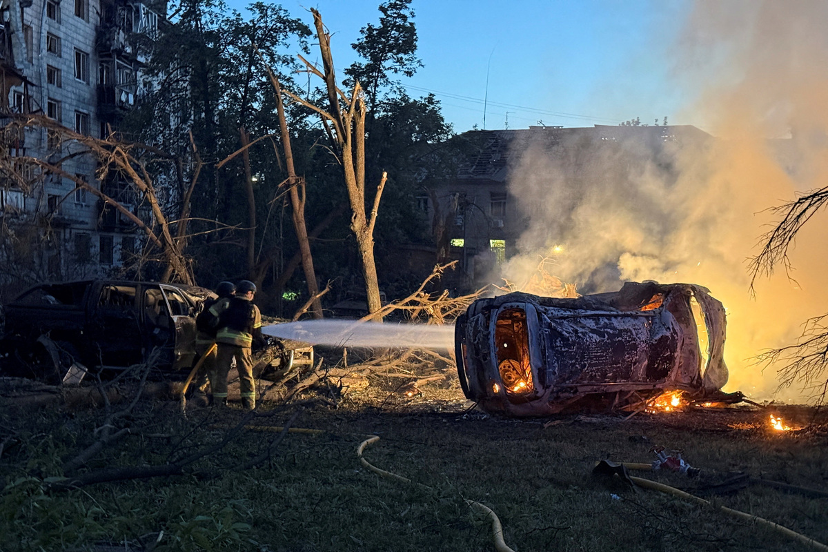 Firefighters work at the site of an apartment building damaged during a Russian missile and drone strike, amid Russia's attack on Ukraine, in Kyiv, Ukraine July 2, 2026. Picture taken with a mobile phone. REUTERS/Stringer