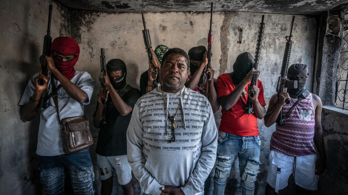 Gang Leader Jimmy ‘Barbecue’ Cherizier with G-9 federation gang members in the Delmas 3 area on February 22, 2024 in Port-au-Prince, Haiti. There has a been fresh wave of violence in Port-au-Prince where, according to UN estimates, gangs control 85 percent of the city.