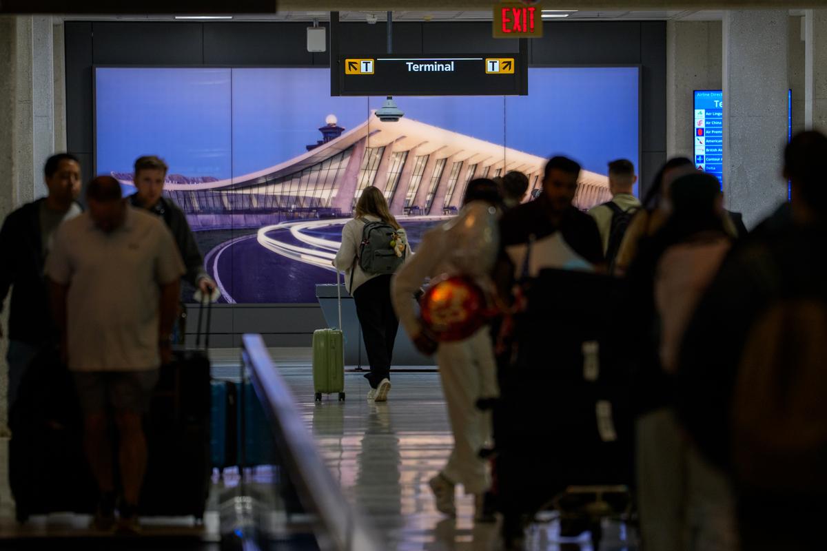  An image of Washington Dulles International Airport is displayed in one of the airport’s tunnels on May 22, 2026, in Dulles, Virginia. 