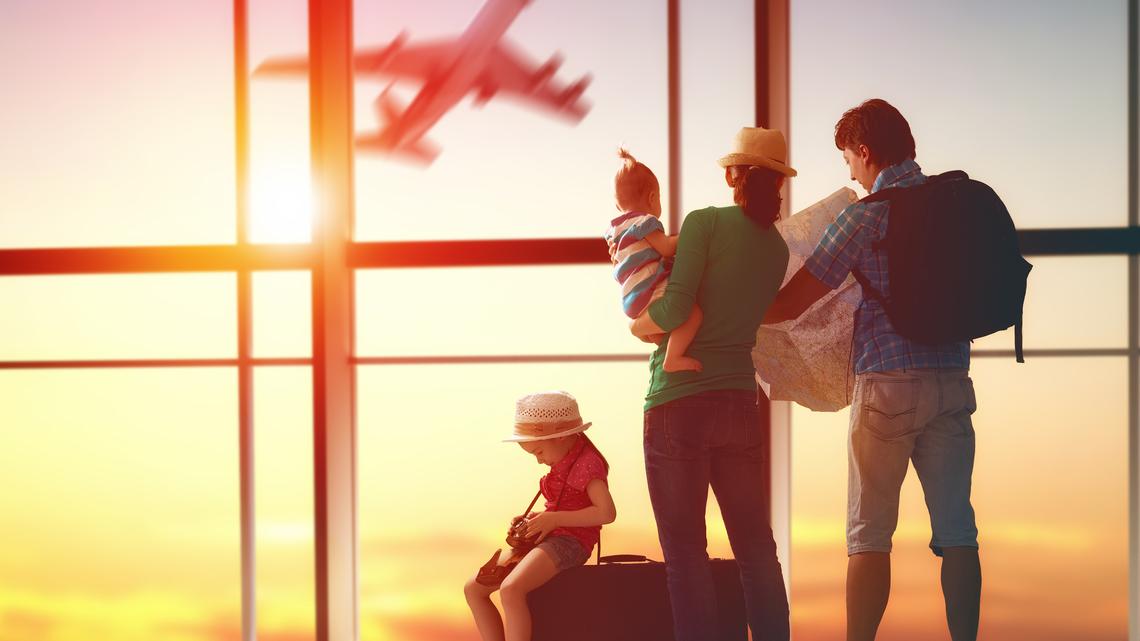 family with suitcases. Happy family with suitcases in the airport.