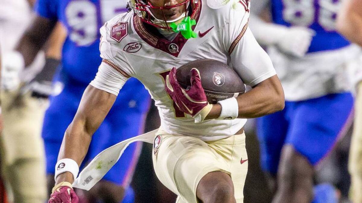  Nov 29, 2025; Gainesville, Florida, USA; Florida State Seminoles wide receiver Micahi Danzy (19) runs the ball during the third quarter against the Florida State Seminoles at Ben Hill Griffin Stadium. Mandatory Credit: Bob Kupbens-Imagn Images | IMAGN IMAGES via Reuters Connect 