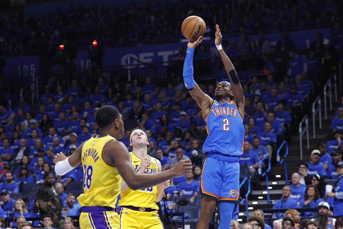  Shai Gilgeous-Alexander shoots over Rui Hachimura in the second half during game one of the second round of the 2026 NBA Playoffs at Paycom Center. Alonzo Adams-Imagn Images