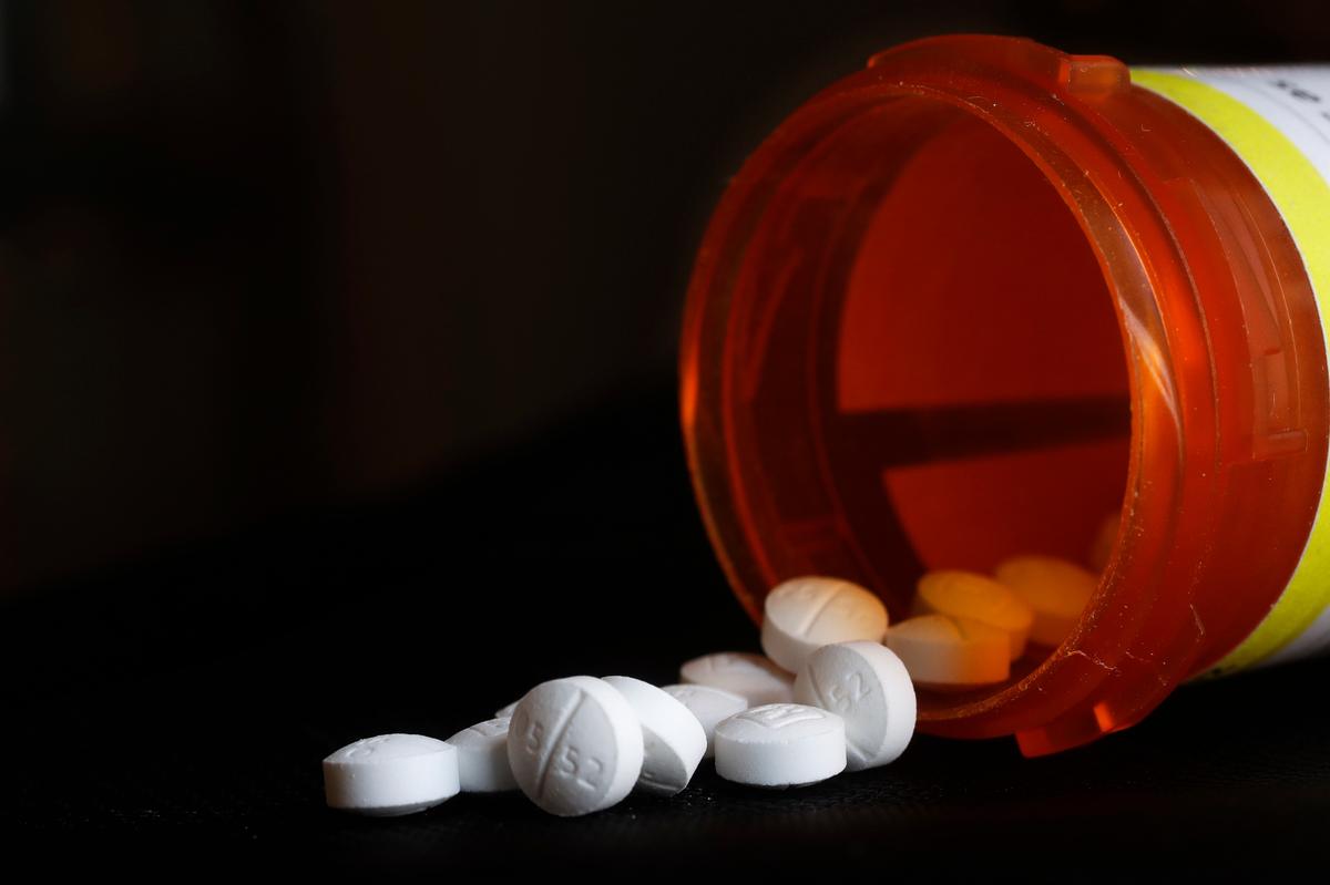 A Tri-Cities woman is sentenced to prison after she issued prescriptions for oxycodone and fentanyl while working as a receptionist and office manager at Desert Wind Family Practice in Richland.