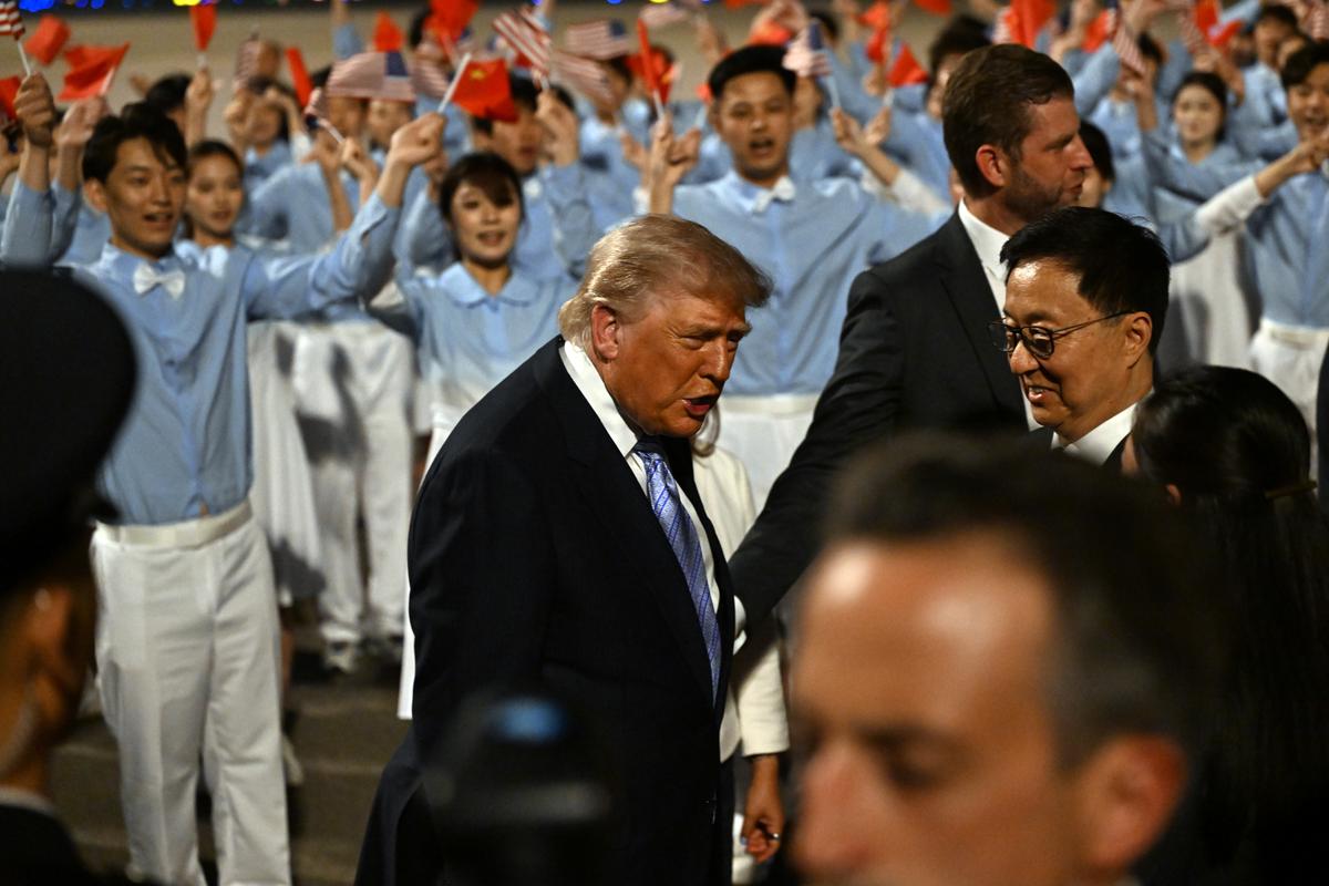 President Donald Trump arrives at Beijing Capital International Airport in Beijing, China, on Wednesday, May 13, 2026, for a two-day summit with China's leader, Xi Jinping. (Kenny Holston/The New York Times)