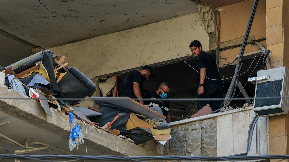 Israel strikes Beirut despite truce, Iran threatens to retaliate
