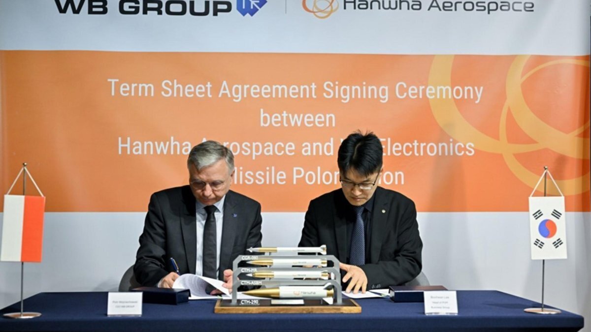 WB Group President Piotr Wojciechowski (L) and Hanwha Aerospace Europe President Billy Boo Hwan Lee (R) attend the signing ceremony between the Polish Defense contractor WB Electronics and South Korea's Hanwha Aerospace agreement at the WB Group Showroom in Warsaw, Poland. Photo by Przemyslaw Piatkowski / EPA