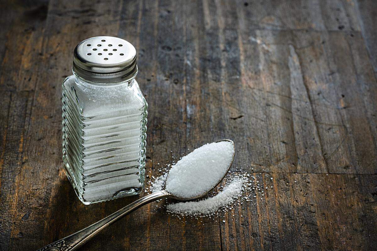 Regular table salt can be used to melt snow and ice in a pinch.
