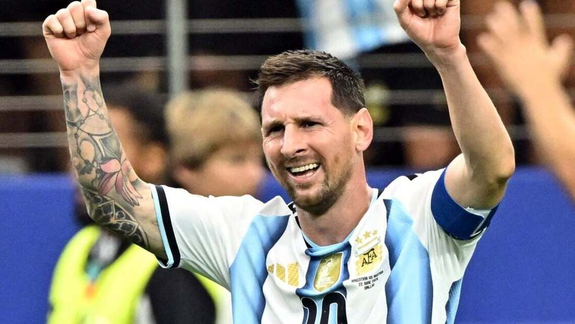 Argentina shut down Austria 2-0 as Lionel Messi makes history 