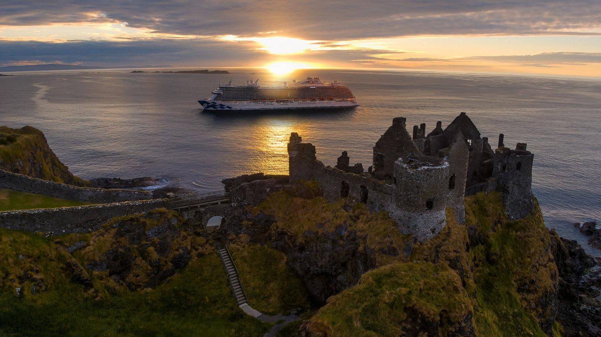 A Princess Cruises ship sails near Dunluce Castle in Belfast, Northern Ireland. 