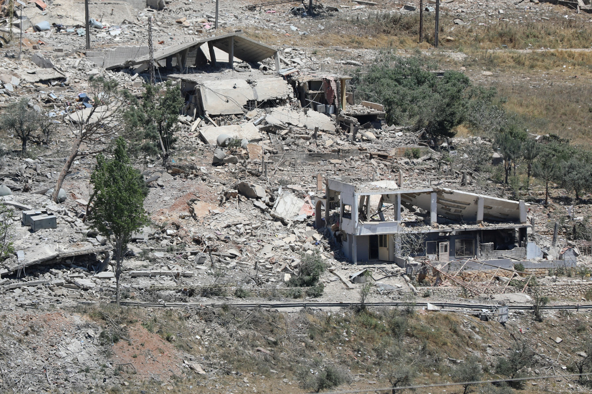 A view of buildings destroyed during the Israeli military campaign, as the Lebanese army opens a road, in Dibbin, southern Lebanon June 4, 2026. REUTERS/Stringer