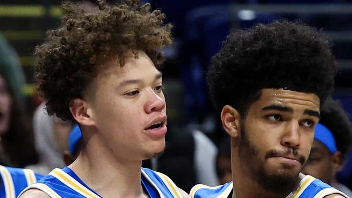  Jan 14, 2026; University Park, Pennsylvania, USA; UCLA Bruins guard Trent Perry (0) is congratulated by guard Eric Freeny (8) after scoring a basket during the second half against the Penn State Nittany Lions at Bryce Jordan Center. Mandatory Credit: Matthew O'Haren-Imagn Images | Matthew O'Haren-Imagn Images 