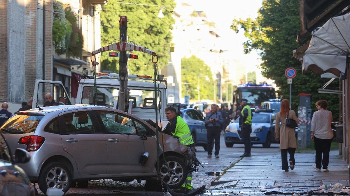 The car that drove into pedestrians is removed from the scene after several people were injured in the center of the northern Italian city of Modena, Italy, May 16, 2026. REUTERS/Stringer