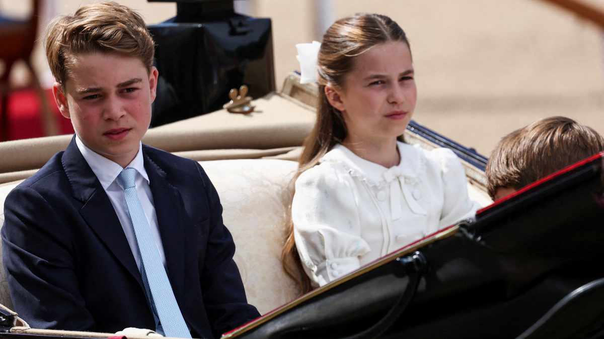 FILE PHOTO: Britain's Prince George, Princess Charlotte, and Prince Louis ride in a carriage during the Trooping the Colour parade to honour Britain's King Charles, as part of the official birthday celebrations, in London, Britain, June 13, 2026. REUTERS/Toby Melville/File Photo