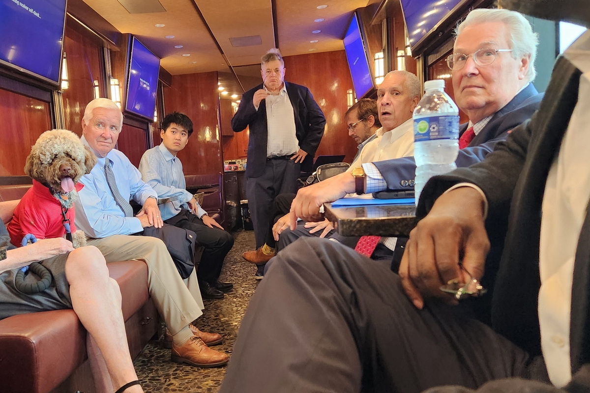 Giancarlo “Carlo” Cappuccino,  Former Ohio Supreme Court Chief Justice Maureen O'Connor’s 18-month-old Lagotto Romagnolo puppy (left) rides in the Justice in Motion tour bus.