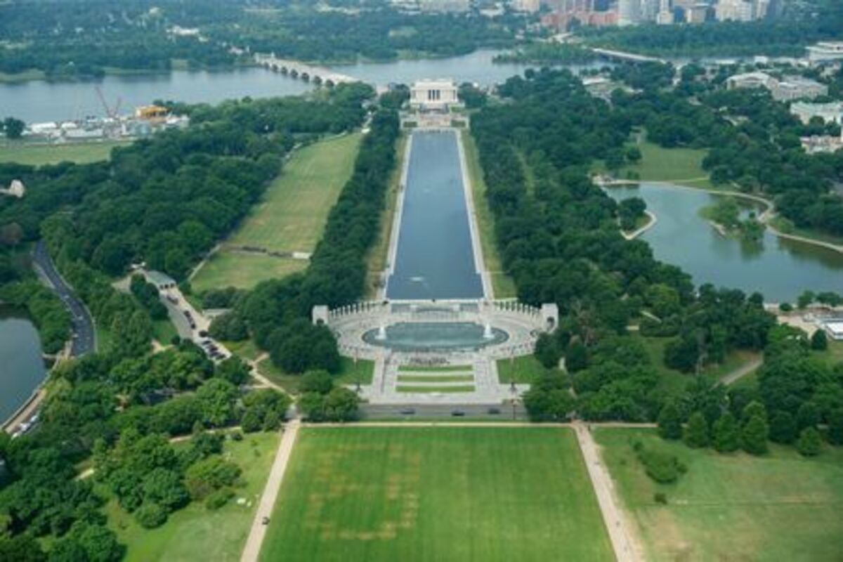 Authorities responded to what appeared to be a large tracing of the term 8647 into the grounds of the National Mall in Washington, D.C., June 11, 2026. A Reuters photographer captured the emerging image from atop the Washington Monument on the Mall's grass shortly before authorities arrived. The arrangement of the numbers was clearly an attempt to show 8647, though the 4 was not fully formed. Federal prosecutors on other occasions have said the term could indicate a threat to President Trump, the 47th U.S. president. REUTERS/ Nathan Howard