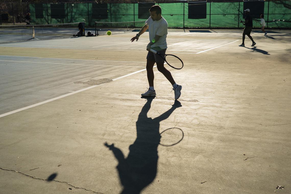 People play tennis at the Fort Greene Park courts in the Brooklyn borough on April 6, 2026. Tennis vs. Pickleball: both are great ways to get out and get moving, and both can cause injuries. But there are a few important differences. (Calla Kessler/The New York Times)