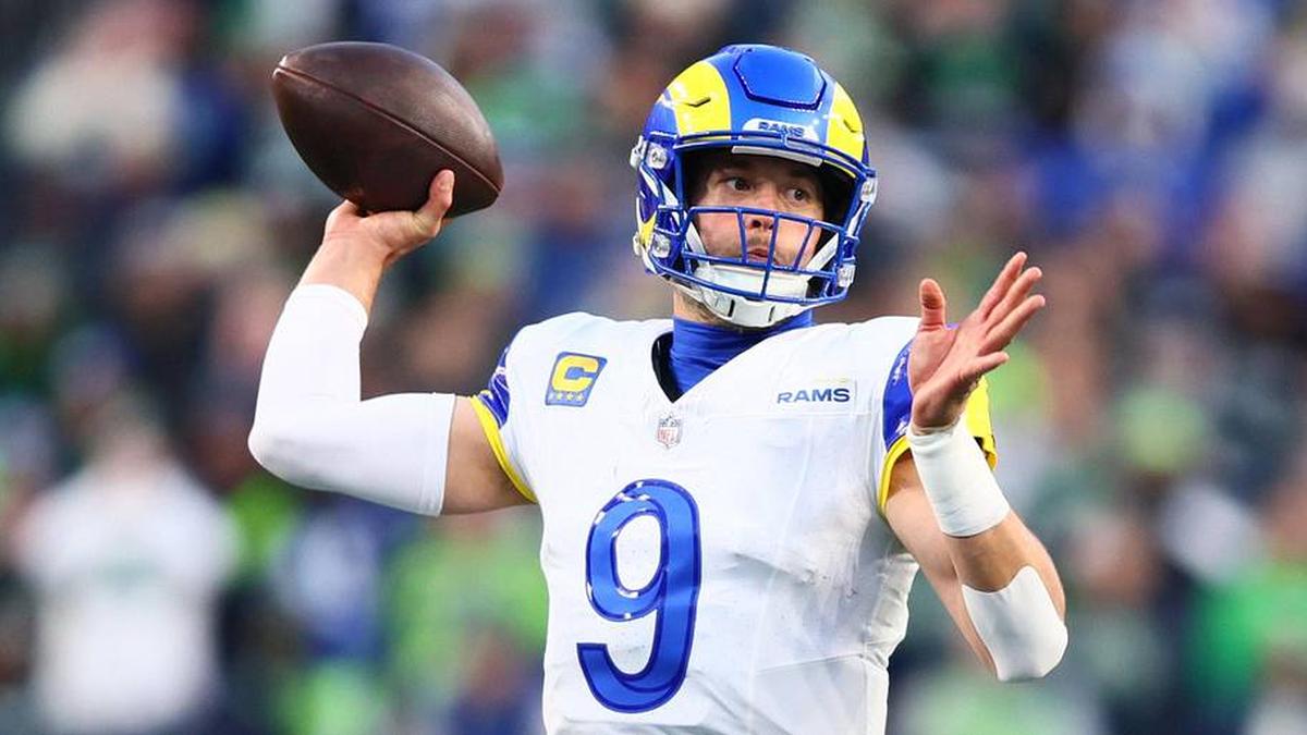  Jan 25, 2026; Seattle, WA, USA; Los Angeles Rams quarterback Matthew Stafford (9) passes against the Seattle Seahawks during the first half in the 2026 NFC Championship Game at Lumen Field. Mandatory Credit: Kevin Ng-Imagn Images | Kevin Ng-Imagn Images 