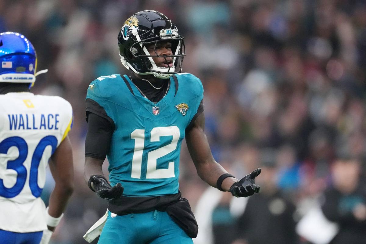  Oct 19, 2025; London, United Kingdom; Jacksonville Jaguars wide receiver Travis Hunter (12) reacts after a play against the Los Angeles Rams during the second half of an NFL International Series game at Wembley Stadium. Mandatory Credit: Kirby Lee-Imagn Images 