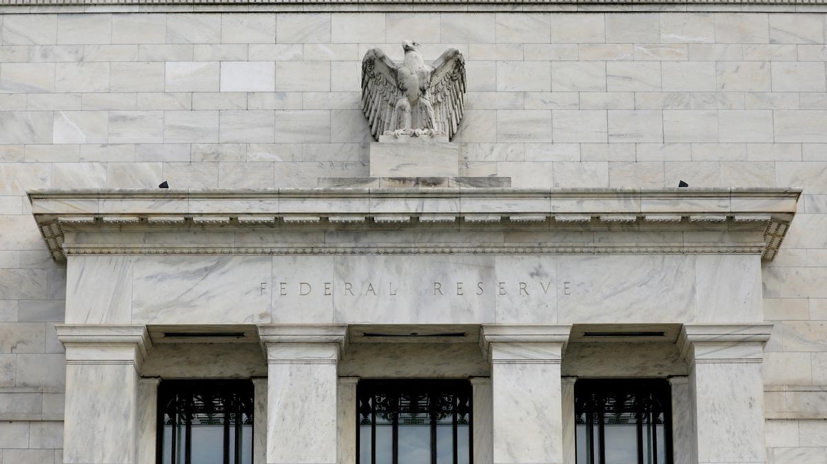 FILE PHOTO: The Federal Reserve building is pictured in Washington, DC, U.S., August 22, 2018. REUTERS/Chris Wattie/File Photo