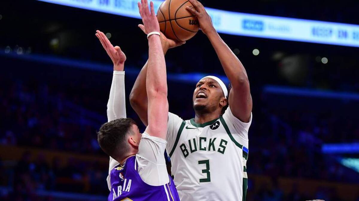  Jan 9, 2026; Los Angeles, California, USA; Milwaukee Bucks center Myles Turner (3) moves to the basket against Los Angeles Lakers forward Jake LaRavia (12) during the first half at Crypto.com Arena. Mandatory Credit: Gary A. Vasquez-Imagn Images | Gary A. Vasquez-Imagn Images 